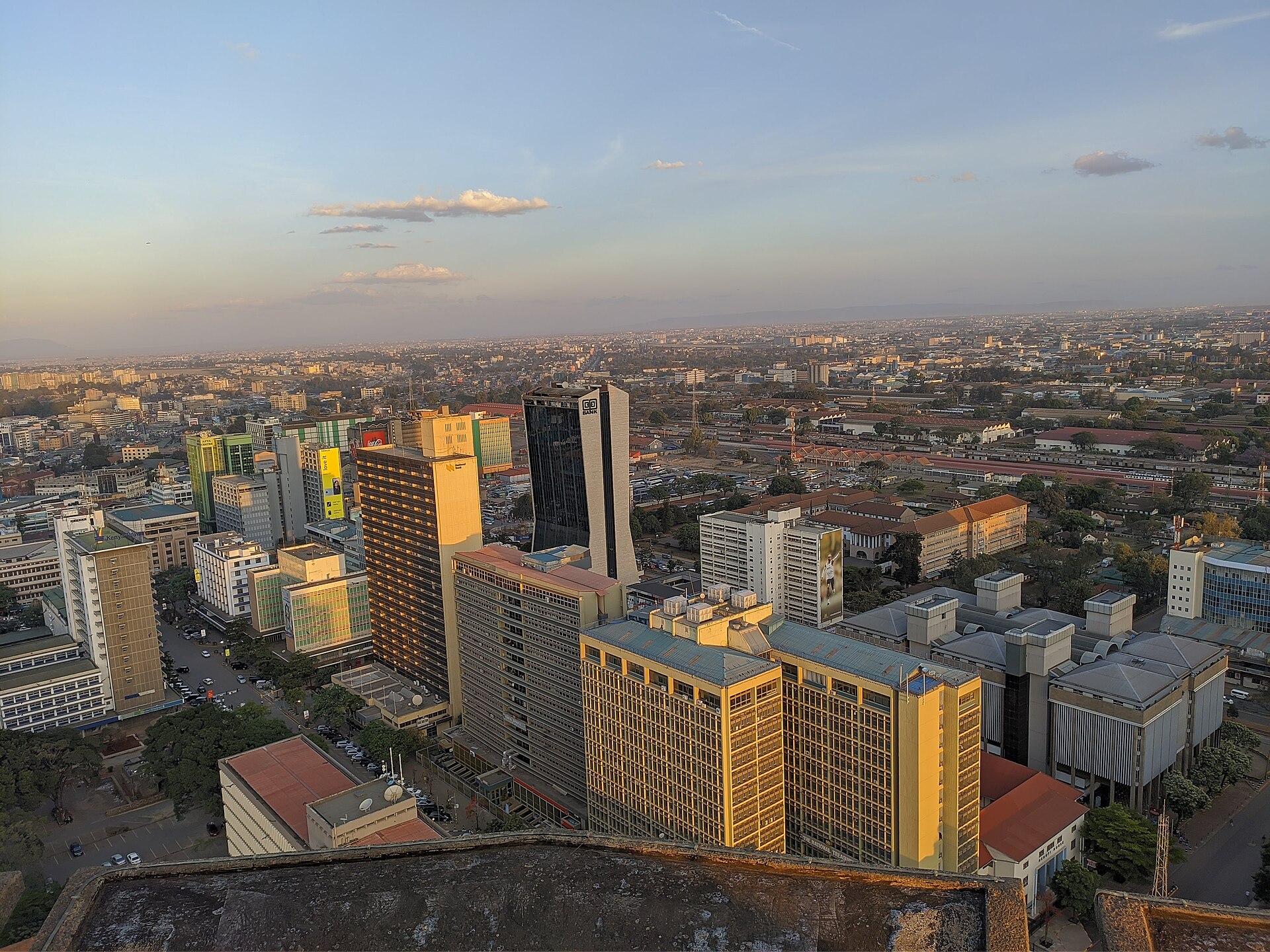 Office blocks in central Nairobi in golden evening light, seen from the KICC rooftop